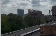 Момент прилета снаряда ВСУ в одно из зданий в центре Донецка 23.08.2023